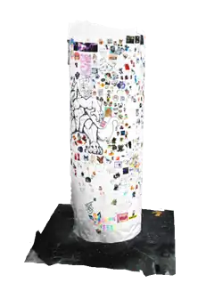 Pillar 2 turning slowly, covered in stickers and drawings